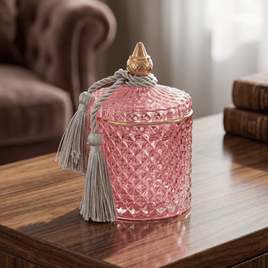 Decorative scented candle in a glass crystal container, rose gold